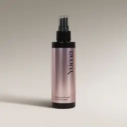 Hair & Body Mist Cotton Candy της YUMA σε μεταλλικό ροζ μπουκάλι με μαύρο πώμα.