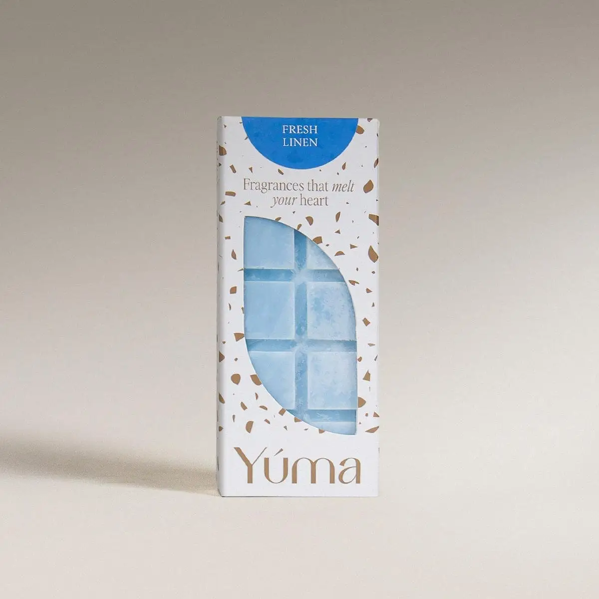 Γαλάζια Wax Melts της YUMA σε λευκή συσκευασία με καφέ μοτίβο και το άρωμα Fresh Linen.