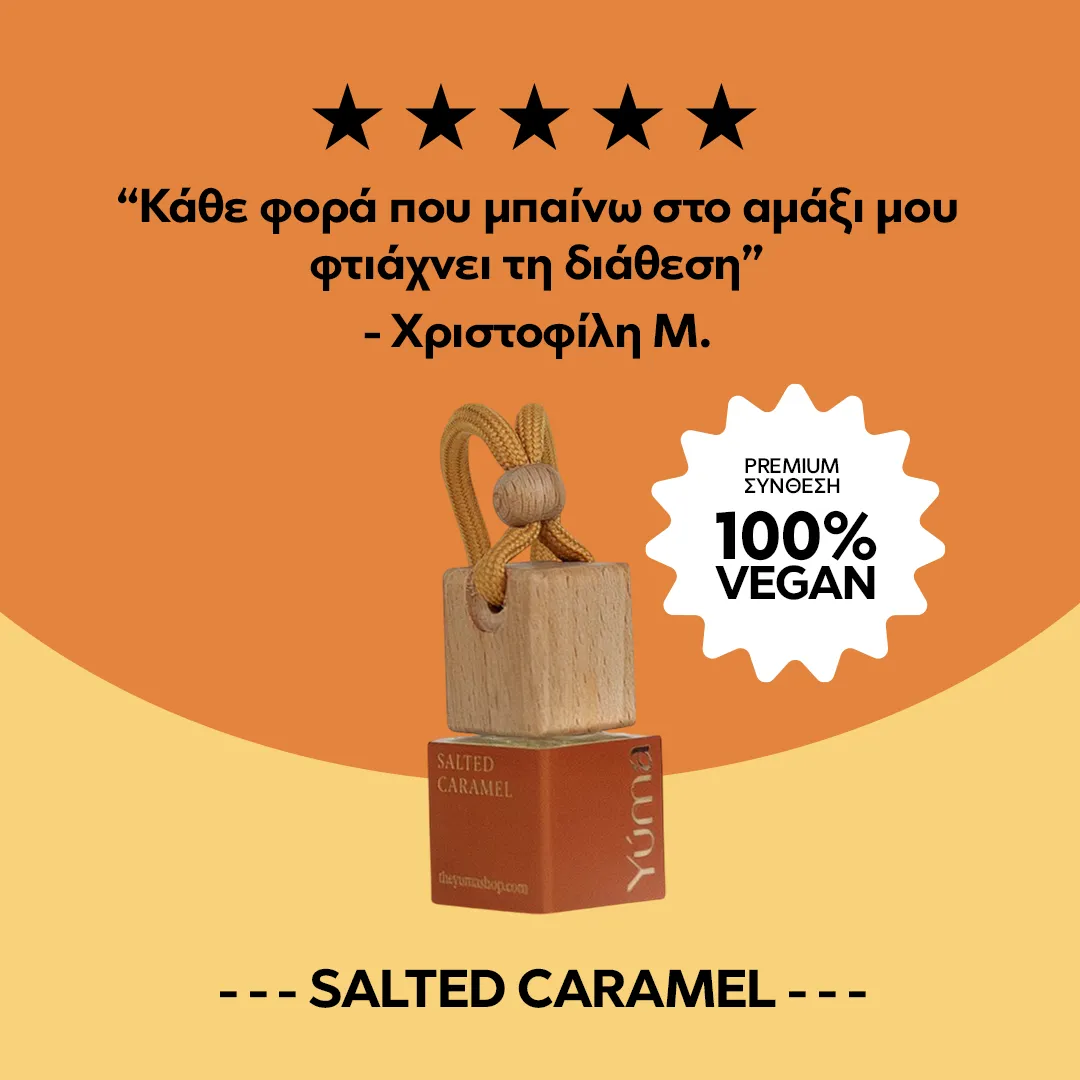 Car Diffuser της YUMA με άρωμα Salted Caramel, ξύλινο πώμα και κορδόνι σε πορτοκαλί φόντο.