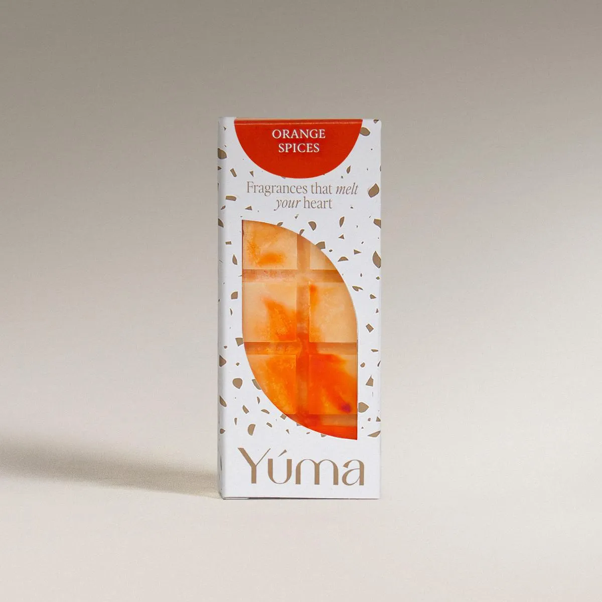 Orange Spices Snap Bar Χάρτινη συσκευασία της YUMA με Wax Melts Orange Spices σε πορτοκαλί αποχρώσεις και λευκό φόντο.